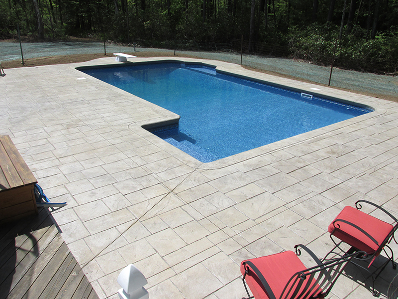 Swimming pool and stamped concrete project example 135
